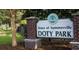 Doty Park entrance sign, surrounded by greenery, inviting you to explore at 4179 Rising Tide Dr, Summerville, SC 29485