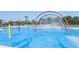 Vibrant splash pad with colorful arches and water features for Gathering fun at 4179 Rising Tide Dr, Summerville, SC 29485