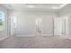 Spacious bedroom featuring neutral tones, carpet flooring and natural lighting at 420 Queen View Ln, Charleston, SC 29414