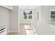 Breakfast nook with large windows and a view of the lake at 420 Queen View Ln, Charleston, SC 29414
