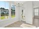 Spacious dining room with views of the lake at 420 Queen View Ln, Charleston, SC 29414