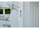 Close-up of the house number '417' displayed in elegant black numerals on a white column at 420 Queen View Ln, Charleston, SC 29414