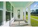 Covered patio overlooking a grassy yard at 420 Queen View Ln, Charleston, SC 29414