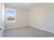 Neutral bedroom with soft gray carpet and large windows at 422 Queenview Ln, Charleston, SC 29414