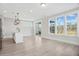 Bright living area with island and large windows with beautiful outside views at 422 Queenview Ln, Charleston, SC 29414