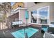 Outdoor deck featuring seating and water views from the rear sliding glass door at 4791 Arco Ln, North Charleston, SC 29418