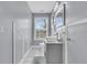Charming bathroom with a vanity sink, neutral colors, and window view at 4791 Arco Ln, North Charleston, SC 29418