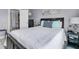 Comfortable bedroom features stylish decor, with an inviting queen-size bed and plenty of natural light at 4791 Arco Ln, North Charleston, SC 29418