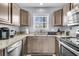 Functional kitchen featuring granite countertops and stainless steel appliances at 4791 Arco Ln, North Charleston, SC 29418
