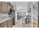 Open-concept kitchen showcasing granite countertops and stainless steel appliances at 4791 Arco Ln, North Charleston, SC 29418