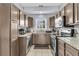 Efficient kitchen with granite countertops and stainless steel appliances at 4791 Arco Ln, North Charleston, SC 29418
