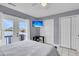 Bright main bedroom features tile floors, double closets, and balcony with nice view at 4791 Arco Ln, North Charleston, SC 29418
