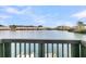 Scenic water view of lake and buildings from private deck at 4791 Arco Ln, North Charleston, SC 29418