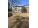 Backyard featuring a sunroom extension and a brick patio at 4793 Popperdam Creek Dr., North Charleston, SC 29418