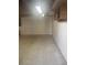 Spacious basement with concrete flooring, white-painted walls, and overhead lighting, offering a versatile space for storage or recreation at 4793 Popperdam Creek Dr., North Charleston, SC 29418