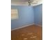 Bedroom featuring light blue walls, a ceiling fan, and hardwood flooring at 4793 Popperdam Creek Dr., North Charleston, SC 29418