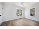 Well lit room with hardwood flooring and two large windows providing natural light at 519 Bank St, Mount Pleasant, SC 29464