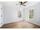 Light and airy bedroom with hardwood floors, a ceiling fan, and natural light from two windows at 519 Bank St, Mount Pleasant, SC 29464