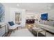 Bright and airy living room with hardwood floors and a view of the kitchen at 519 Bank St, Mount Pleasant, SC 29464