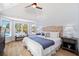 Cozy main bedroom with vaulted ceiling, lots of windows, ceiling fan and neutral decor at 519 Bank St, Mount Pleasant, SC 29464