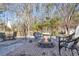 Inviting backyard with a cozy fire pit, comfortable seating, and a charming swing at 544 Beverly Dr, Summerville, SC 29485