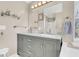 Bathroom featuring a double sink vanity, a large mirror, and modern fixtures at 544 Beverly Dr, Summerville, SC 29485
