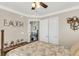 Bedroom featuring a four poster bed, with door to en-suite bathroom at 544 Beverly Dr, Summerville, SC 29485