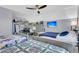 Bright bedroom featuring two beds, ceiling fan, and desk area at 544 Beverly Dr, Summerville, SC 29485