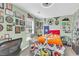 Bedroom featuring an exercise bike, bed, and lots of wall decor at 544 Beverly Dr, Summerville, SC 29485