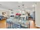Bright dining area with glass table, with open access to living room and kitchen at 544 Beverly Dr, Summerville, SC 29485