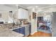 Open kitchen with a view of the breakfast nook and stainless steel appliances with blue cabinets at 544 Beverly Dr, Summerville, SC 29485