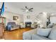 Inviting living room featuring hardwood floors, cozy seating, and a fireplace at 544 Beverly Dr, Summerville, SC 29485
