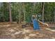 Community playground with slides and play equipment set in a shaded, wooded area at 544 Beverly Dr, Summerville, SC 29485
