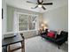 Bedroom with lots of natural light, a ceiling fan, and neutral carpeting at 59 Oyster Point, Charleston, SC 29412