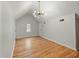 Bonus room with hardwood floors, a vaulted ceiling, recessed lights, and many electrical outlets at 59 Oyster Point, Charleston, SC 29412