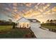 Charming single-story home boasts a well-manicured lawn and a two-car garage, perfect for comfortable living at 640 Cottage Landing Drive, Summerville, SC 29485