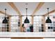 An array of tiles and design options are showcased under modern pendant lighting at 640 Cottage Landing Drive, Summerville, SC 29485