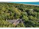 Desirable neighborhood on the water, featuring mature trees, beach access, and single Gathering homes at 65 Surfsong Rd, Kiawah Island, SC 29455