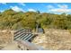 Inviting boardwalk trail leading through lush vegetation towards a beautiful sandy beach at 65 Surfsong Rd, Kiawah Island, SC 29455