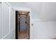 Interior view of a residential elevator featuring a safety gate and wood flooring at 65 Surfsong Rd, Kiawah Island, SC 29455