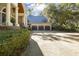 Spacious three-car garage with ample parking and a well-maintained driveway at 65 Surfsong Rd, Kiawah Island, SC 29455