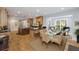 Bright open-concept kitchen and breakfast nook, features a large center island and premium appliances at 65 Surfsong Rd, Kiawah Island, SC 29455