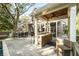 Outdoor kitchen with a beautiful deck and pool at 65 Surfsong Rd, Kiawah Island, SC 29455