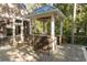 Outdoor kitchen, bar, and pool on the deck at 65 Surfsong Rd, Kiawah Island, SC 29455