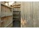 Rustic outdoor shower stall featuring wood construction and a simple, functional design at 65 Surfsong Rd, Kiawah Island, SC 29455