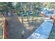 Overhead view of backyard showcasing the fence line, shed, and mature trees at 676 Sterling Dr, Charleston, SC 29412