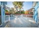Spacious back deck perfect for outdoor entertaining. With a new paint job and modern railing at 676 Sterling Dr, Charleston, SC 29412