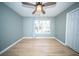 Bright bedroom featuring wood floors, natural light, and closet at 676 Sterling Dr, Charleston, SC 29412