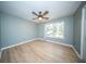 Empty bedroom with natural light, wood floors and ceiling fan at 676 Sterling Dr, Charleston, SC 29412
