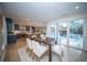 Inviting dining room with table, chairs, and sliding glass doors, seamlessly connecting indoor and outdoor spaces at 676 Sterling Dr, Charleston, SC 29412